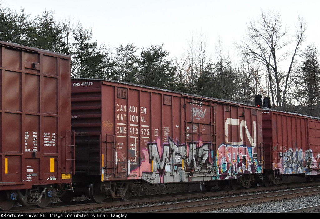 413575